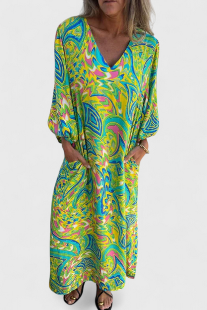 Vestido Maxi Bohemio Carmina con Escote en V y Estampado Abstracto