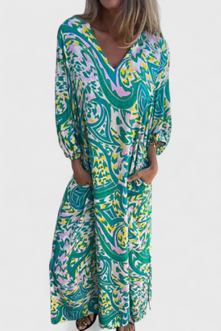 Vestido Maxi Bohemio Carmina con Escote en V y Estampado Abstracto