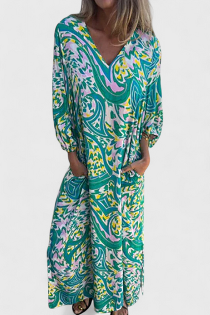 Vestido Maxi Bohemio Carmina con Escote en V y Estampado Abstracto