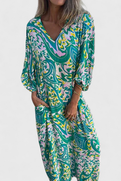 Vestido Maxi Bohemio Carmina con Escote en V y Estampado Abstracto