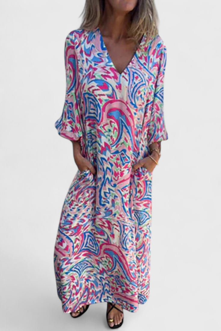 Vestido Maxi Bohemio Carmina con Escote en V y Estampado Abstracto