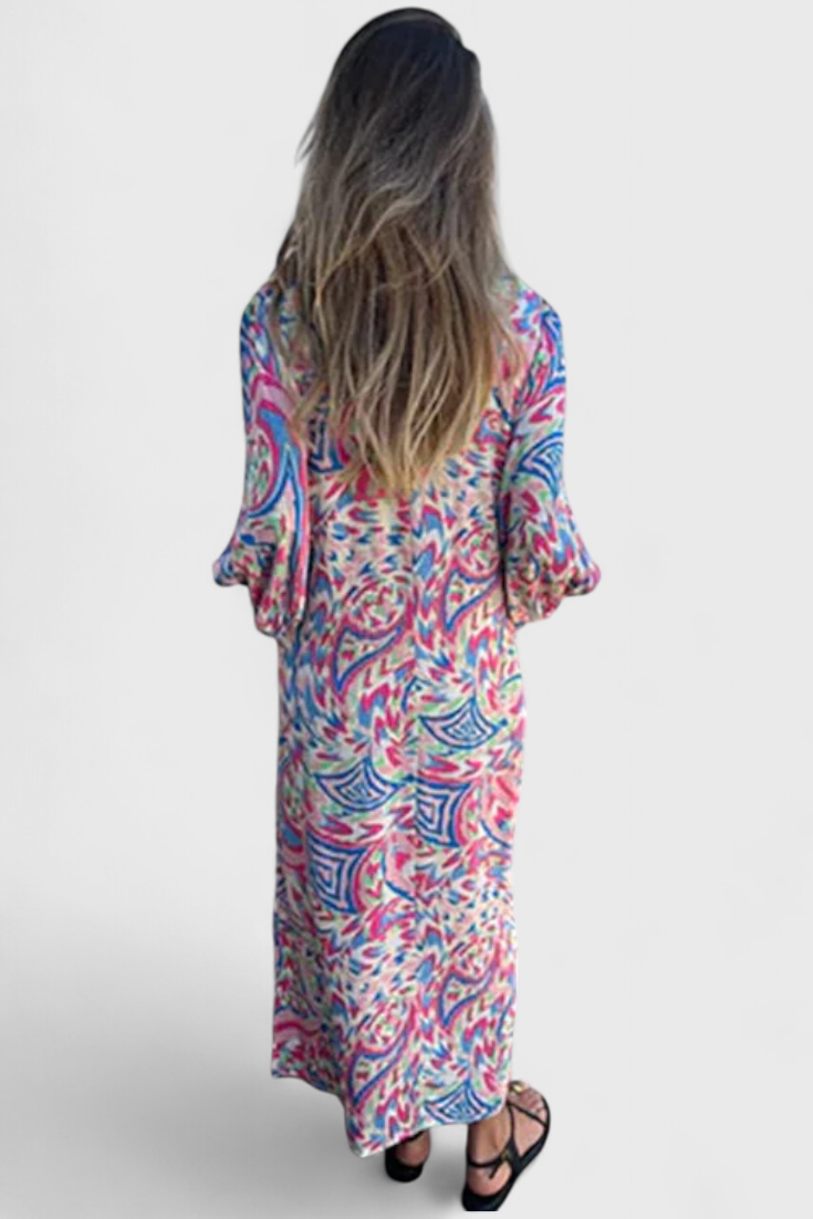 Vestido Maxi Bohemio Carmina con Escote en V y Estampado Abstracto