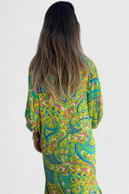 Vestido Maxi Bohemio Carmina con Escote en V y Estampado Abstracto