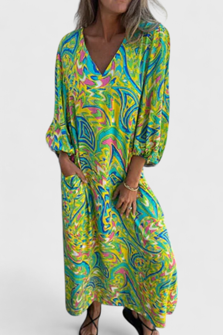 Vestido Maxi Bohemio Carmina con Escote en V y Estampado Abstracto