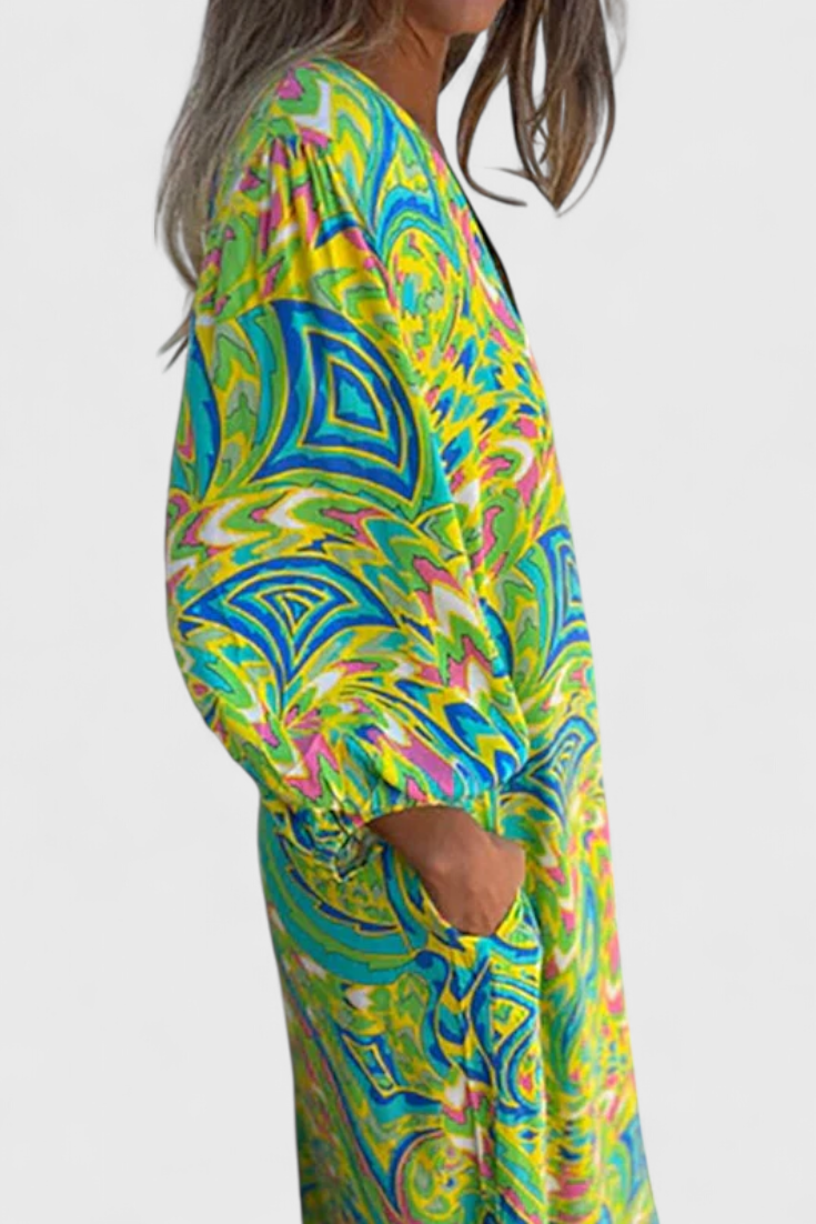 Vestido Maxi Bohemio Carmina con Escote en V y Estampado Abstracto